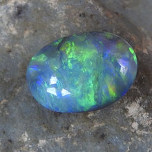 Load image into Gallery viewer, Lightning Ridge Solid Black Opal with Green Blue Yellow Colors.