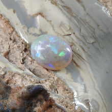 Load image into Gallery viewer, Lightning Ridge Solid Opal with Green Blue Colors.