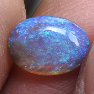 Australian Solid Black Crystal Opal with Green Blue Colors