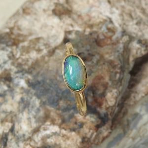 Solid Lightning Ridge Black Crystal Opal Ring with Green Blue Colors